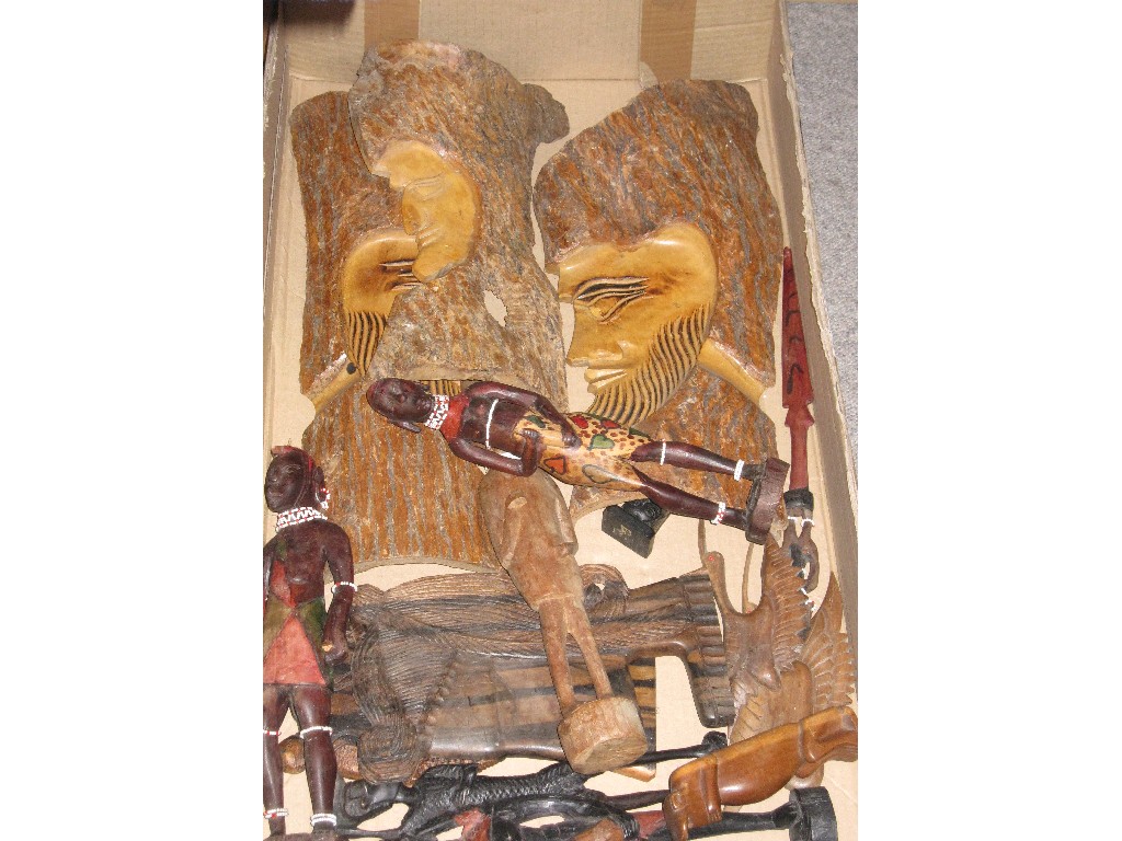 Appraisal: Box of assorted wooden figures and masks