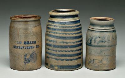 Appraisal: Three stoneware canning jars blue straight and wavy line decoration