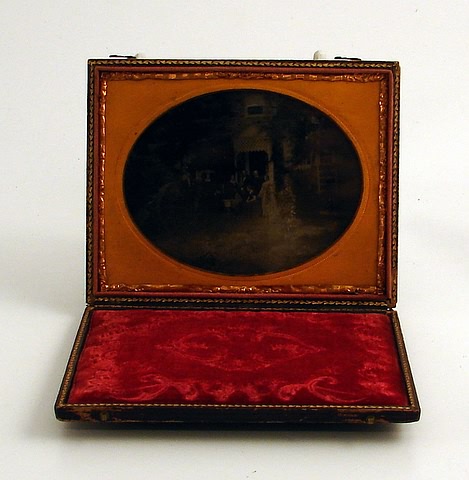 Appraisal: Ambrotype featuring group of men and women in outdoor garden