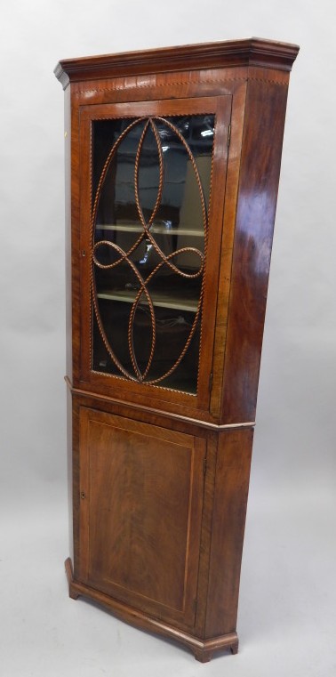 Appraisal: A thC mahogany standing corner cabinet with chequer banding the