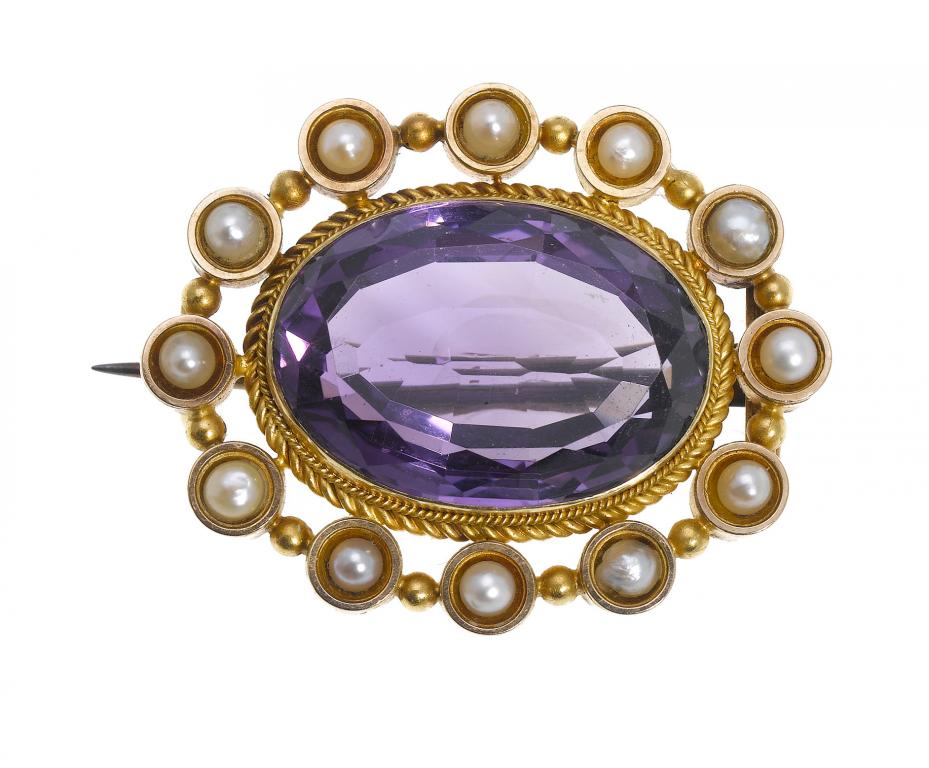 Appraisal: AN AMETHYST AND CULTURED PEARL BROOCH the larger oval amethyst