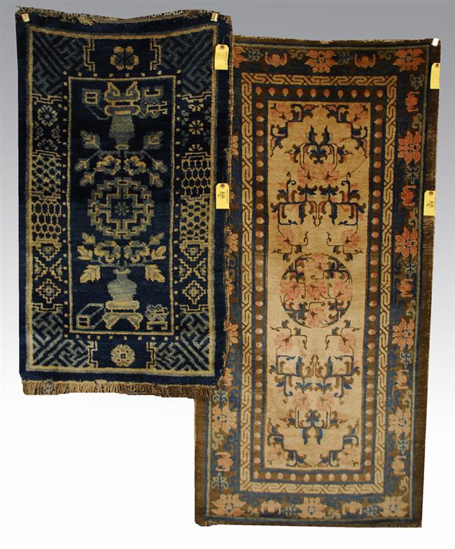 Appraisal: TWO CHINESE RUGS late th century one with wool foundation