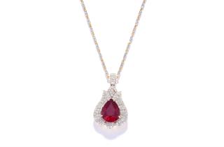 Appraisal: A RUBY AND DIAMOND TWO TONE PENDANT A RUBY AND