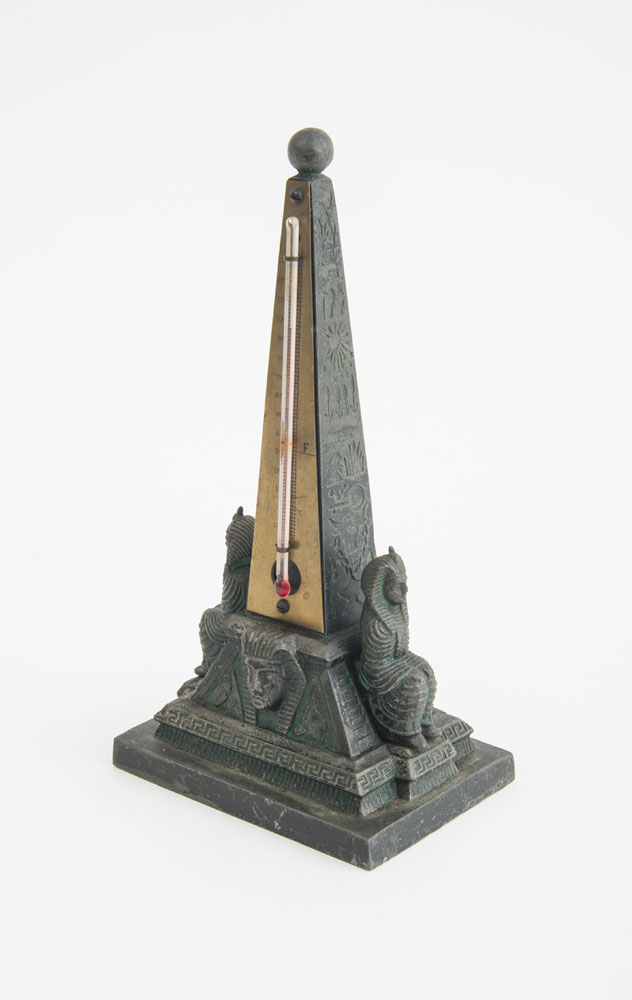 Appraisal: EGYPTIAN REVIVAL OBELISK THERMOMETER With flanking pharaohs patinated spelter circa