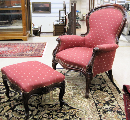 Appraisal: VICTORIAN STYLE ARMCHAIR AND OTTOMAN American late th and early