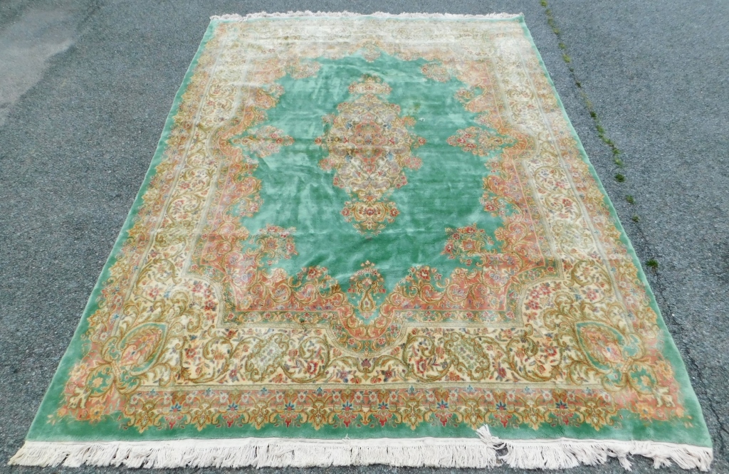 Appraisal: LG GREEN BOTANICAL RUG Middle East th CenturyBlue pale orange