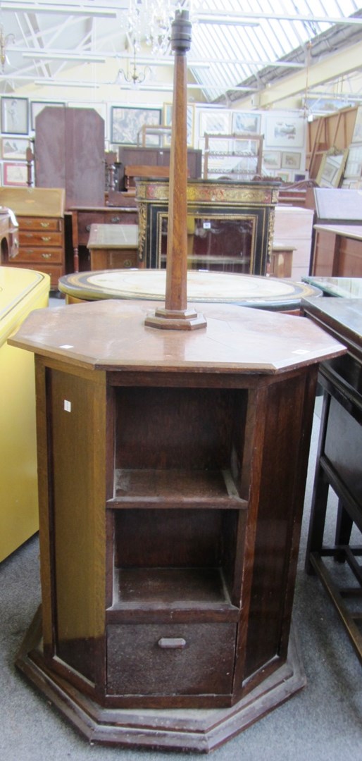 Appraisal: An early th century oak octagonal revolving bookcase with integral