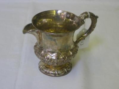 Appraisal: A WILLIAM IV JUG of baluster form with moulded rim