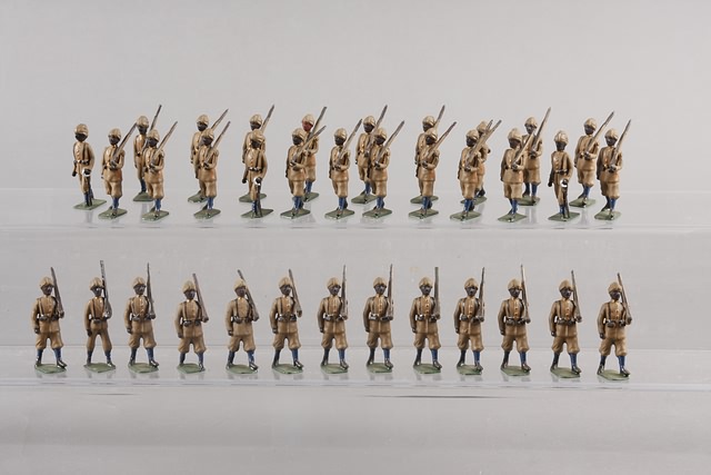 Appraisal: Lot of metal figures representing British Sepoys Northwest Frontier marching