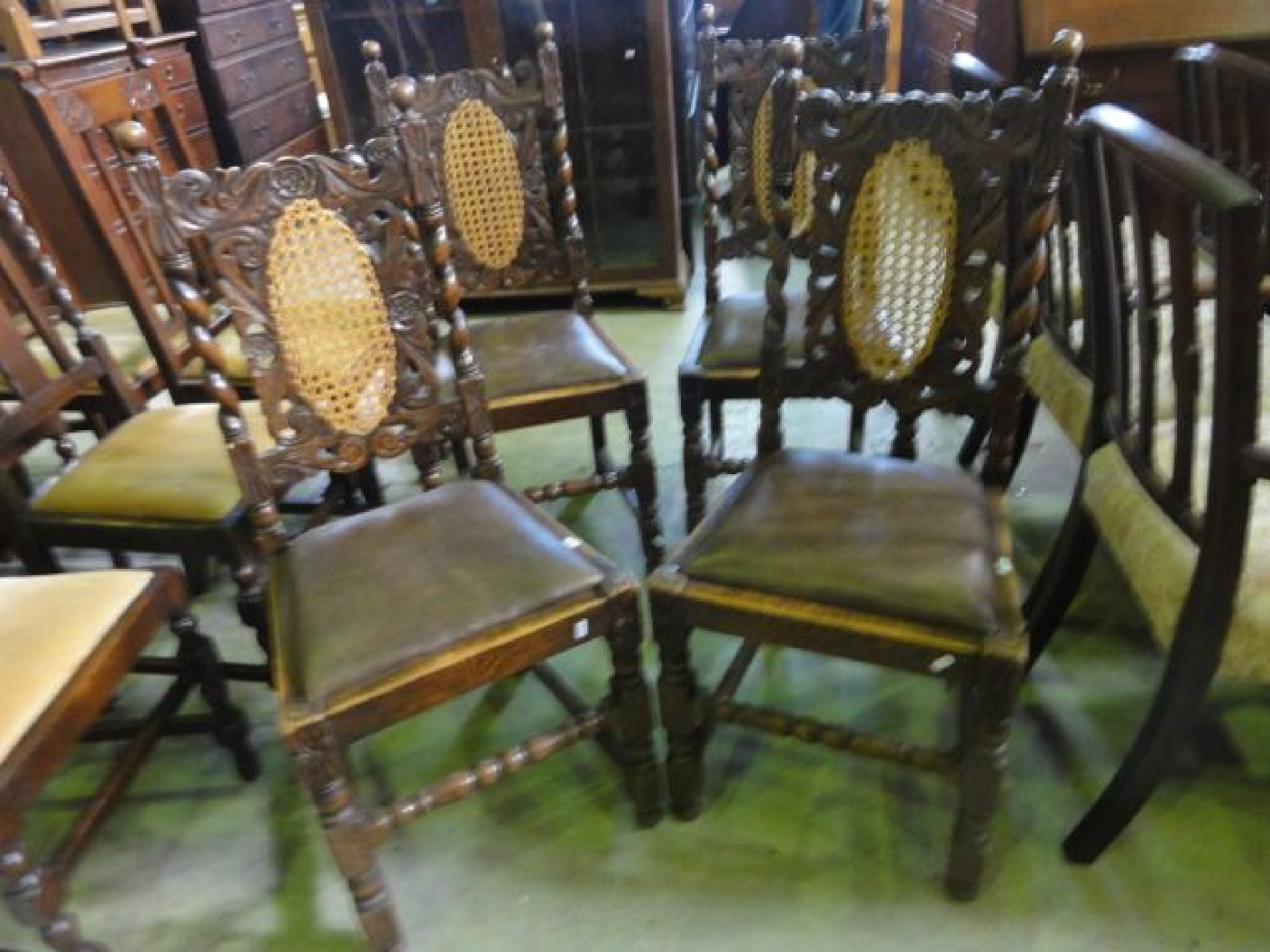 Appraisal: A set of four late Victorian oak dining chairs loosely