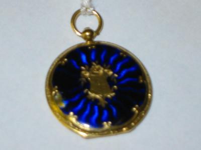 Appraisal: A VICTORIAN CIRCULAR GOLD LOCKET with blue enamelled back and