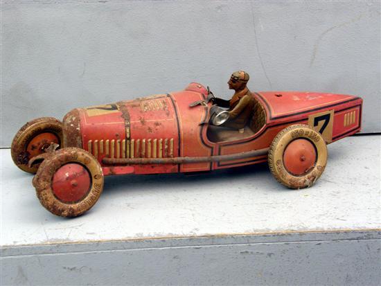 Appraisal: - s toy tin plate sports car with driver w