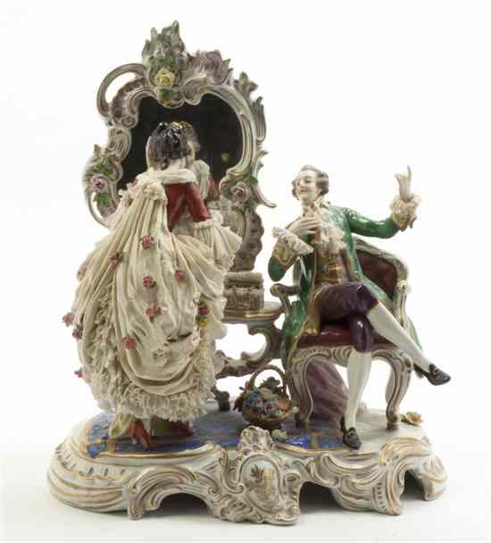 Appraisal: A Dresden Porcelain Lace Figural Group depicting a courting couple