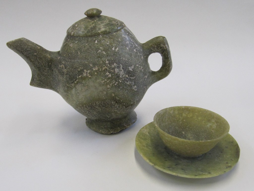 Appraisal: Green hardstone teapot and a similar teabowl and saucer