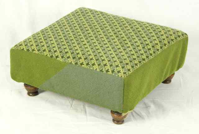 Appraisal: A Victorian mahogany foot stool the square upholstered top on