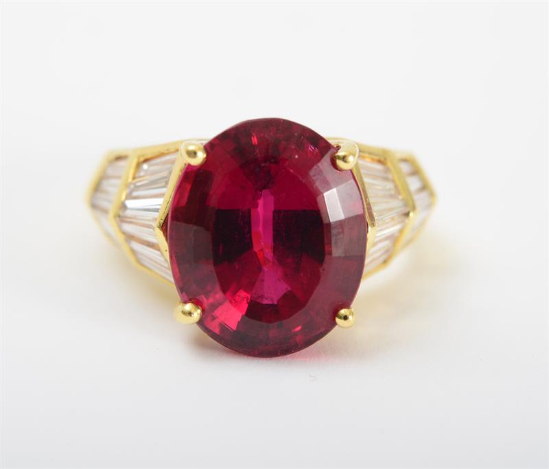 Appraisal: K GOLD RUBELLITE AND DIAMOND RING Centering an oval-shaped rubellite