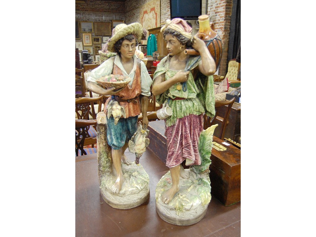 Appraisal: A pair of large th century Bohemian majolica figures of