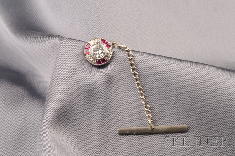 Appraisal: Platinum and Diamond Pin bezel-set with full-cut diamond weighing approx