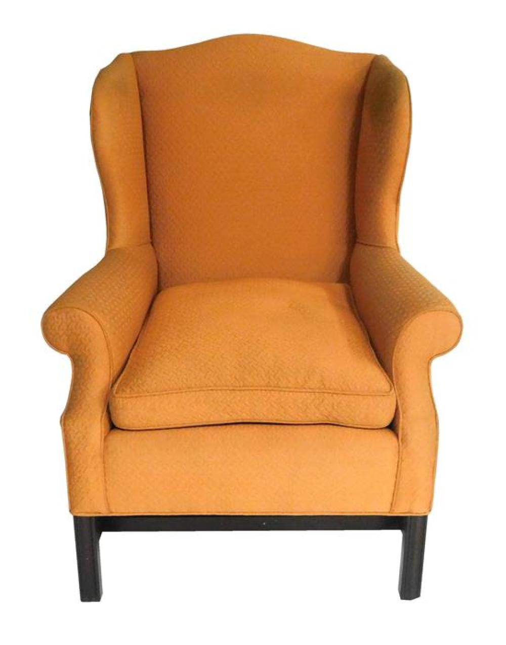 Appraisal: Persimmon colored upholstered wingback chair on squared legs H-stretcher wear