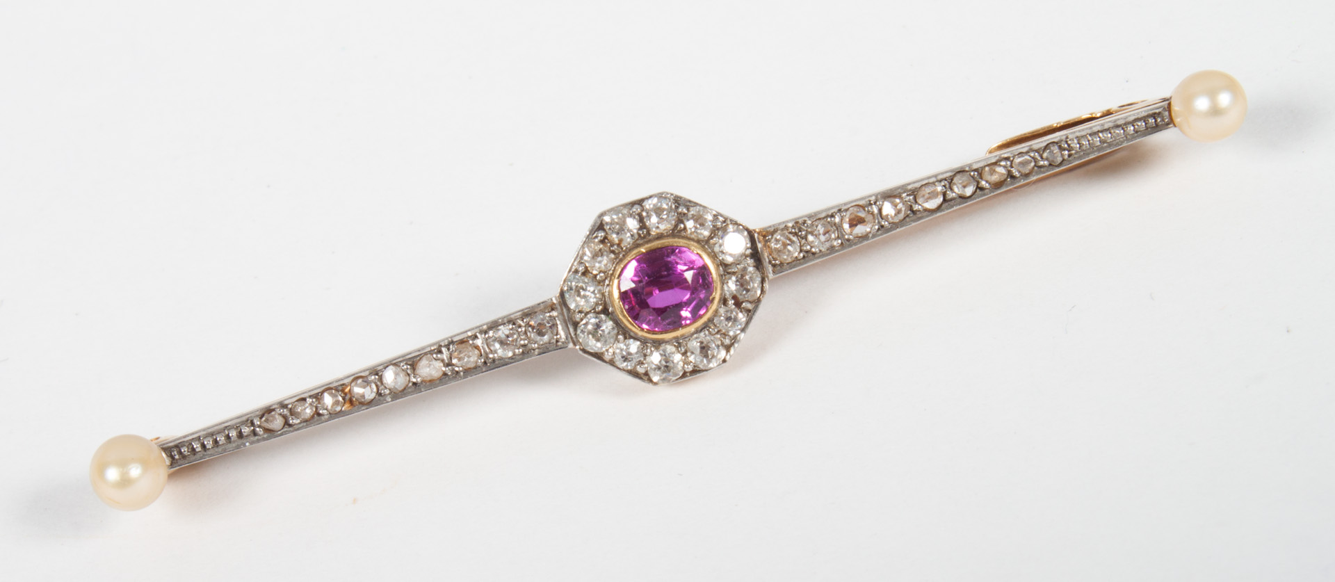 Appraisal: Art Deco bar brooch with ruby diamonds center ruby surrounded