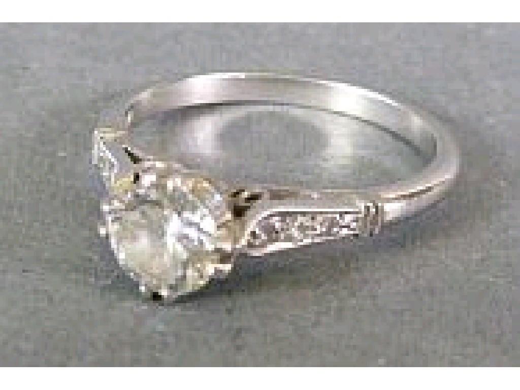 Appraisal: PLATINUM RING SET WITH A SOLITAIRE DIAMOND approx ct the