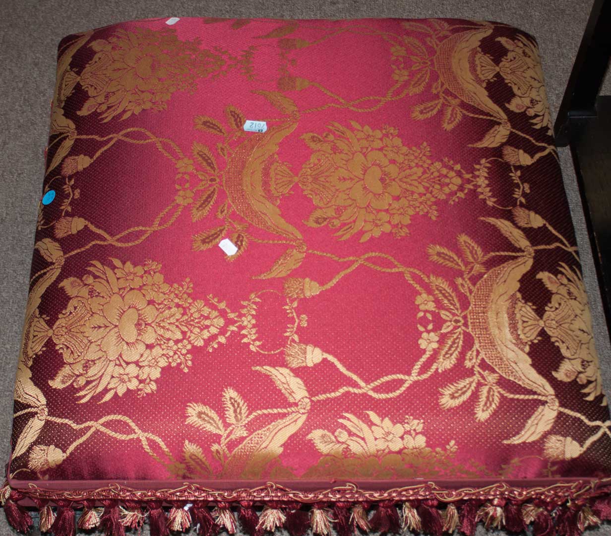 Appraisal: Upholstered footstool with metal feet