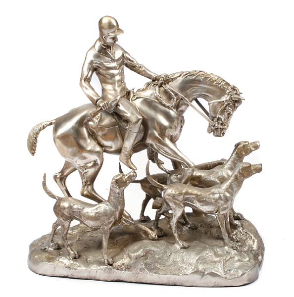 Appraisal: A silvered bronze figure of a hunter on horseback height