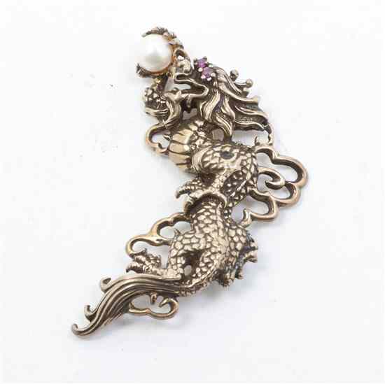 Appraisal: A Sterling Silver Dragon Pendant having a vermeil wash with