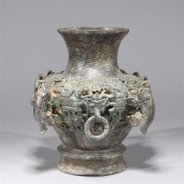 Appraisal: Chinese intricate bronze archaistic vessel with numerous molded handles and