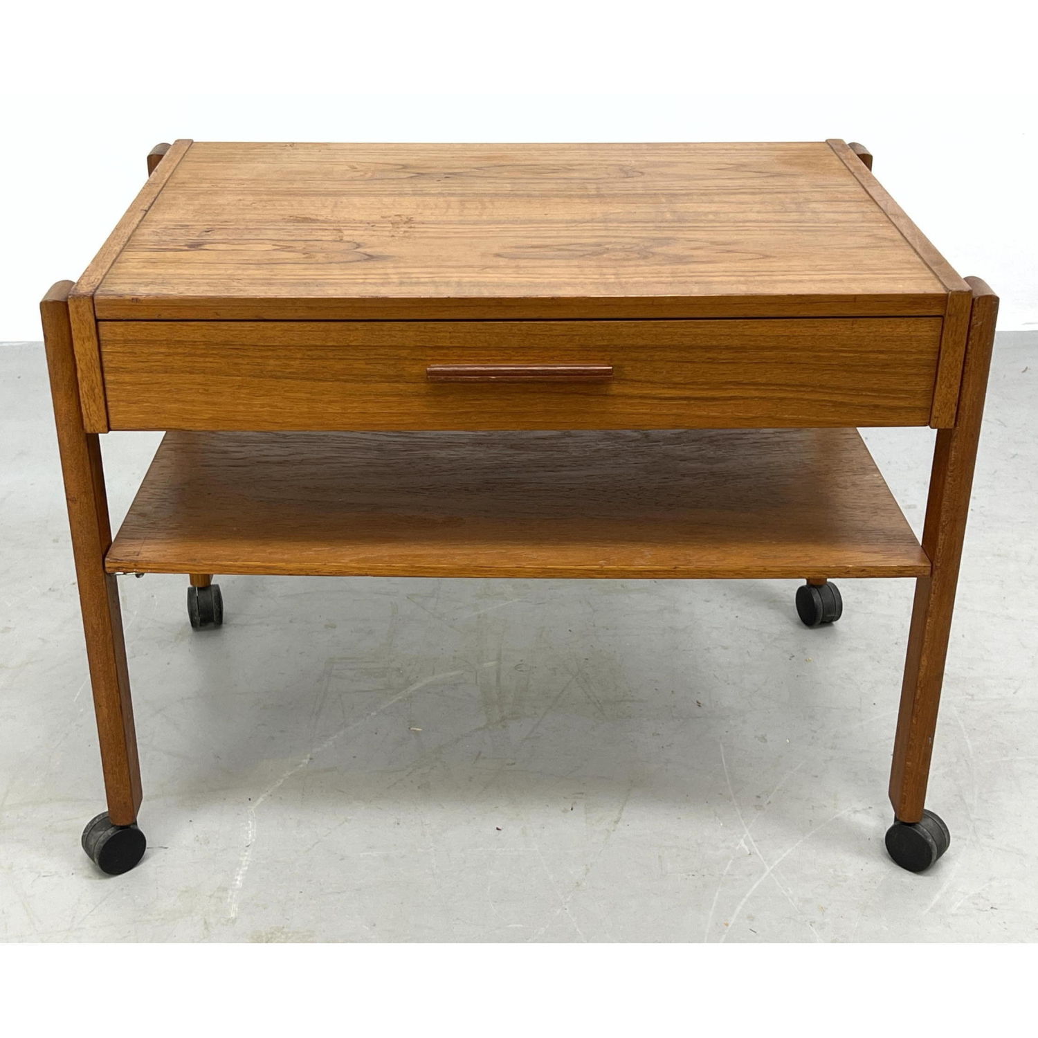 Appraisal: Danish Modern Teak Rolling Side Table on wheels Night stand