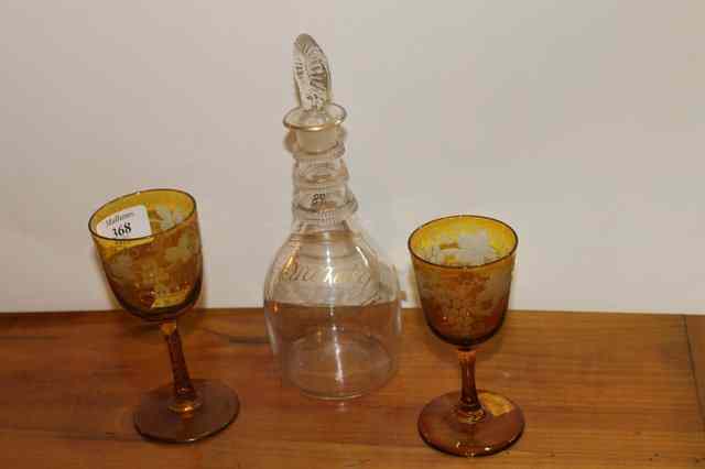 Appraisal: A PAIR OF TH CENTURY YELLOW WINE GLASSES with stylised