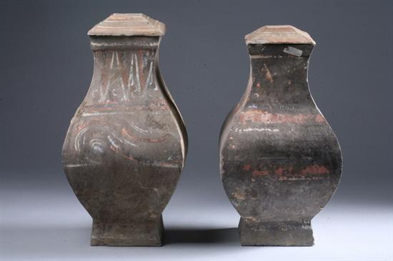 Appraisal: TWO CHINESE GREY POTTERY VESSELS Han Dynasty With remains of