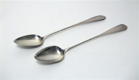 Appraisal: A pair of George III stuffing spoons by F Howden