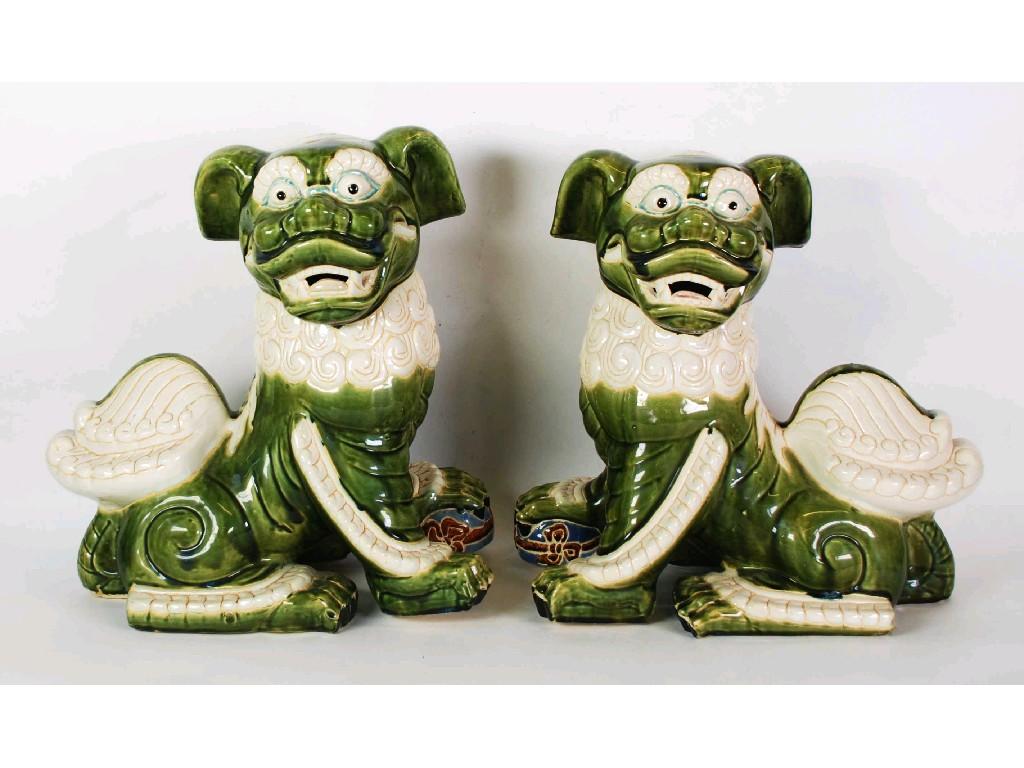 Appraisal: PAIR OF CHINESE LARGE POTTERY MODELS OF DOGS OF FO