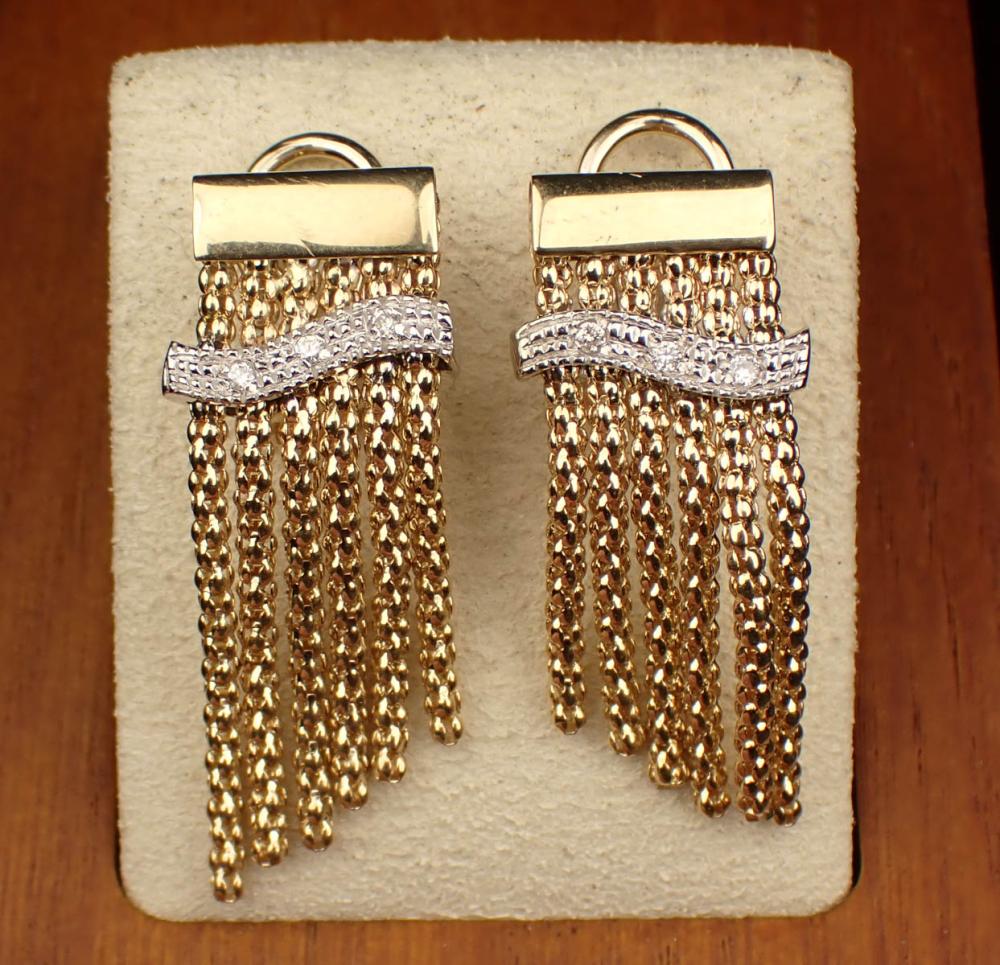 Appraisal: PAIR OF DIAMOND AND FOURTEEN KARAT GOLD EARRINGS each Italian