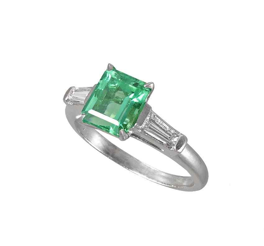 Appraisal: PLATINUM CT EMERALD WITH DIAMONDS Platinum ring centers an emerald