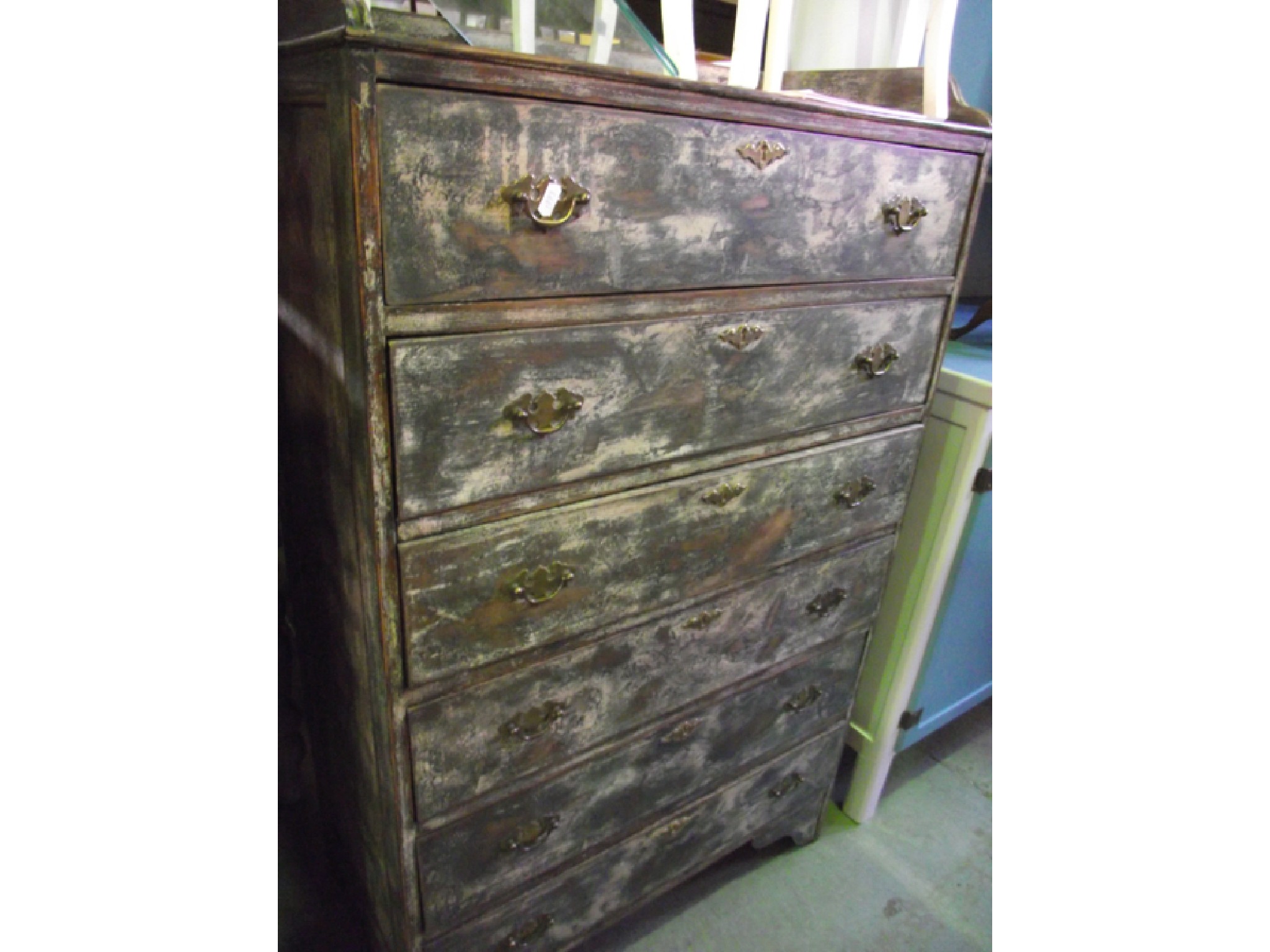 Appraisal: An oak chest of six long drawers with painted and