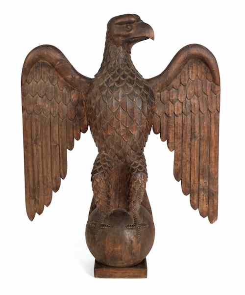 Appraisal: Carved pine eagle ca standing atop an orb h