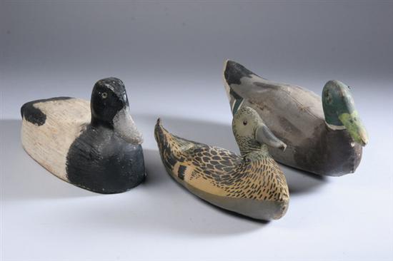 Appraisal: CARVED AND PAINTED WOOD BLUEBILL DECOY AND TWO CANVAS STUFFED