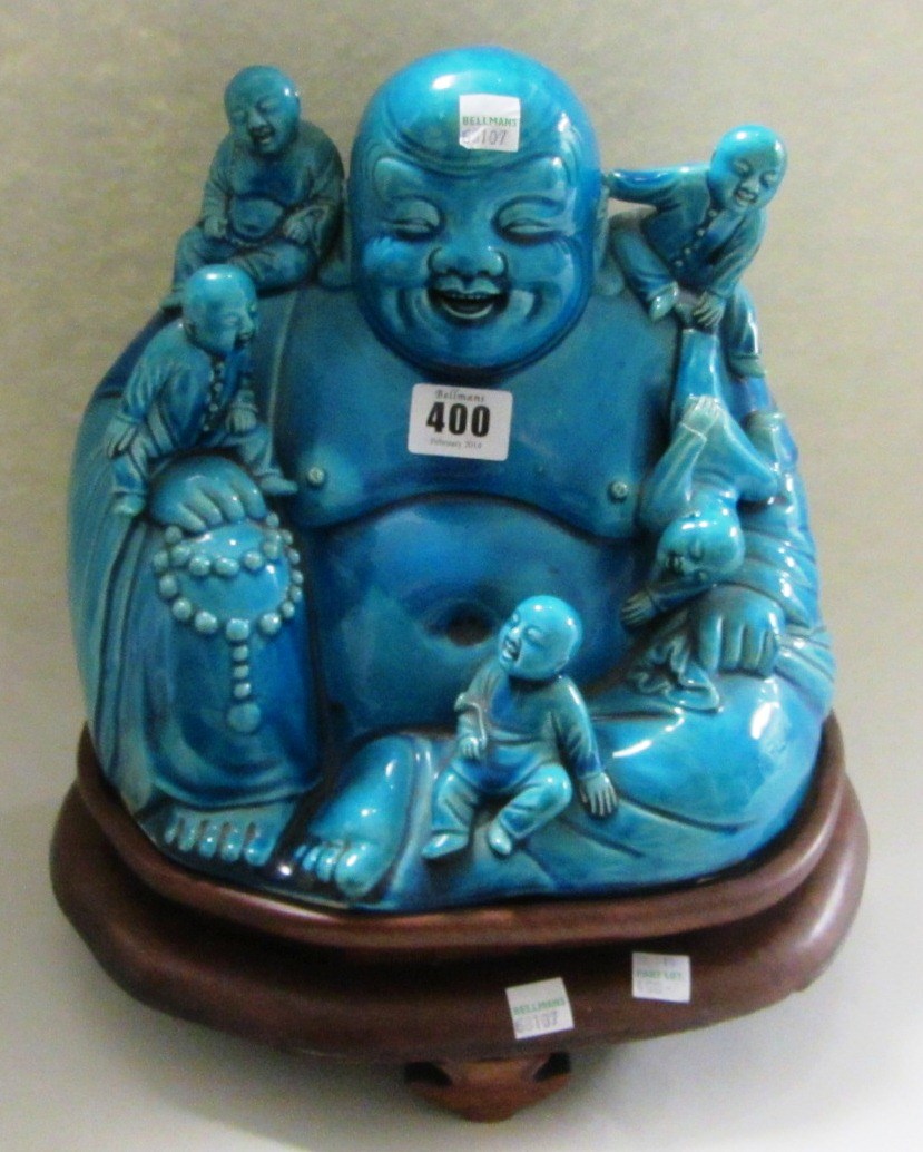 Appraisal: A Chinese group of Budai late th th century modelled