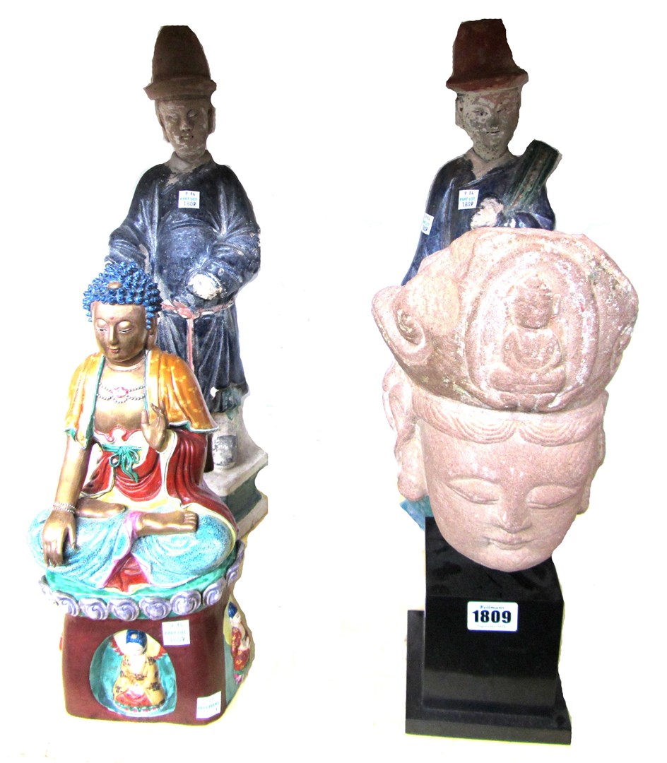 Appraisal: A pair of Thai pottery figural roof finials th century