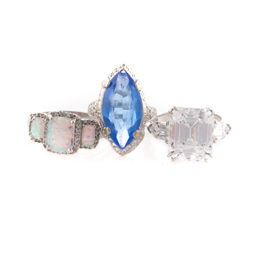 Appraisal: A Trio of Lady's Gemstone Rings K white gold ring