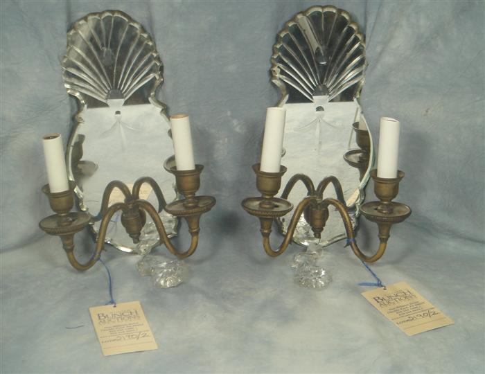 Appraisal: Pair of brass and beveled mirror wall sconces h Estimate