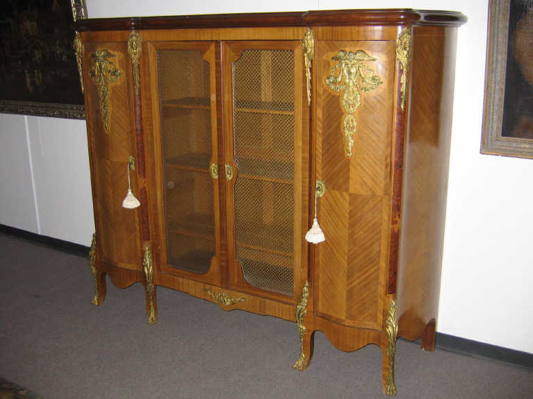 Appraisal: FRENCH BREAKFRONT ORMOLU DISPLAY CABINET Flat top over the central