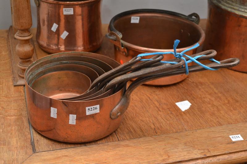 Appraisal: A SET OF FIVE COPPER SAUCEPANS A SET OF FIVE