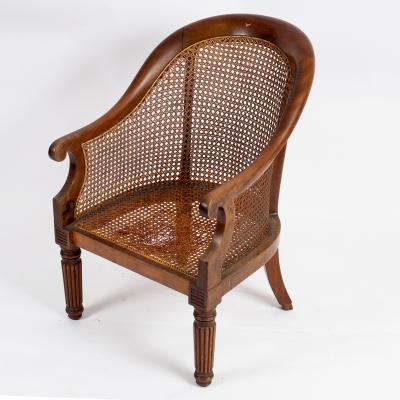 Appraisal: A William IV rosewood berg re circa with scrolled arms