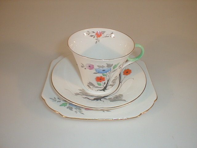 Appraisal: A Shelley china Perth trio decorated with flower sprays and