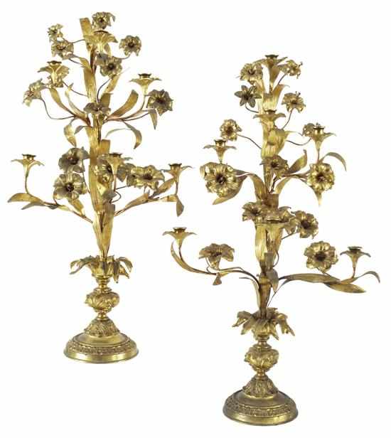 Appraisal: A PAIR OF FOLIATE GILT METAL SIDE GARNITURES Each with