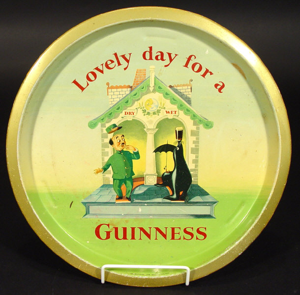 Appraisal: Guinness advertising tin tray printed with a weather house cm