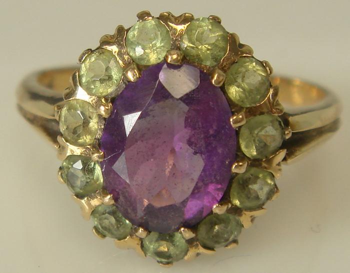 Appraisal: K yg Amethyst and Peridot Ring Center oval cut amethyst